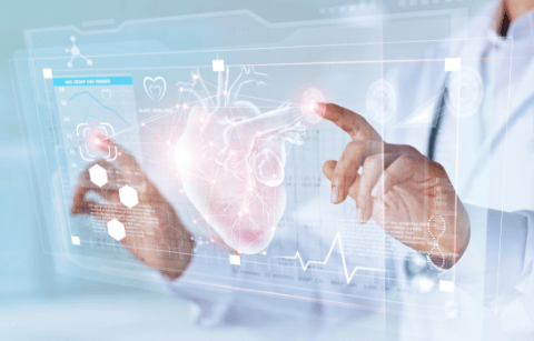 Medic touching digital heart on a screen