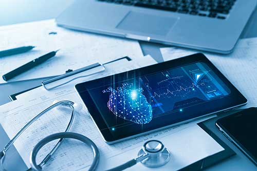 ipad and stethoscope on a doctors desk